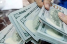  Dólar sobe 1,15% e fecha a R$ 5,09 em dia de cautela 