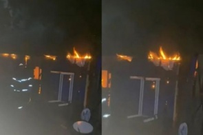 Mulher é resgatada de casa em chamas abraçada com os 4 filhos