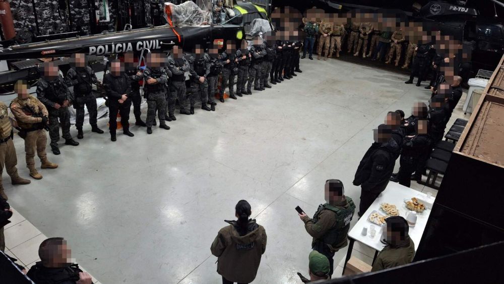 Agentes de segurança se reúnem durante megaoperação contra o PCC (Foto: Divulgação/MPSC)